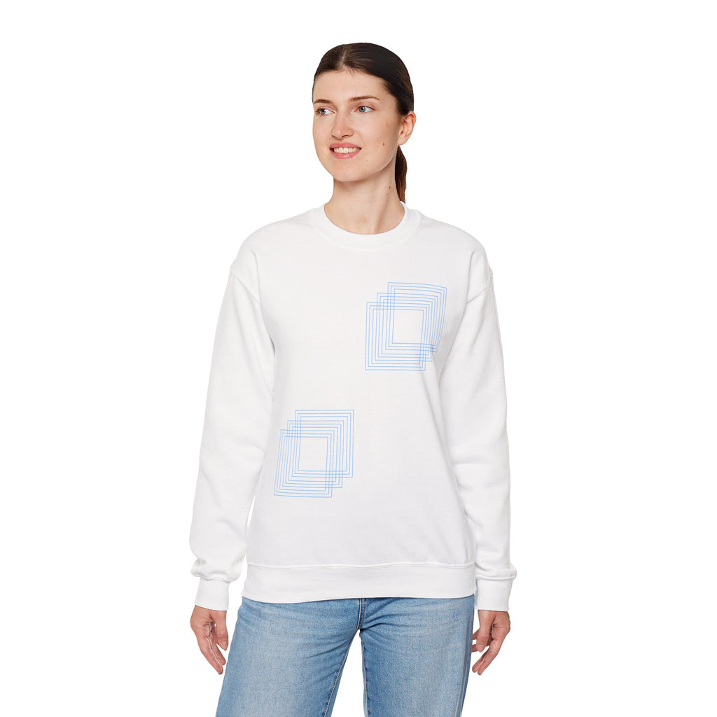White cotton sweatshirt with blue geometric square design, worn by woman, Comfy Elegance