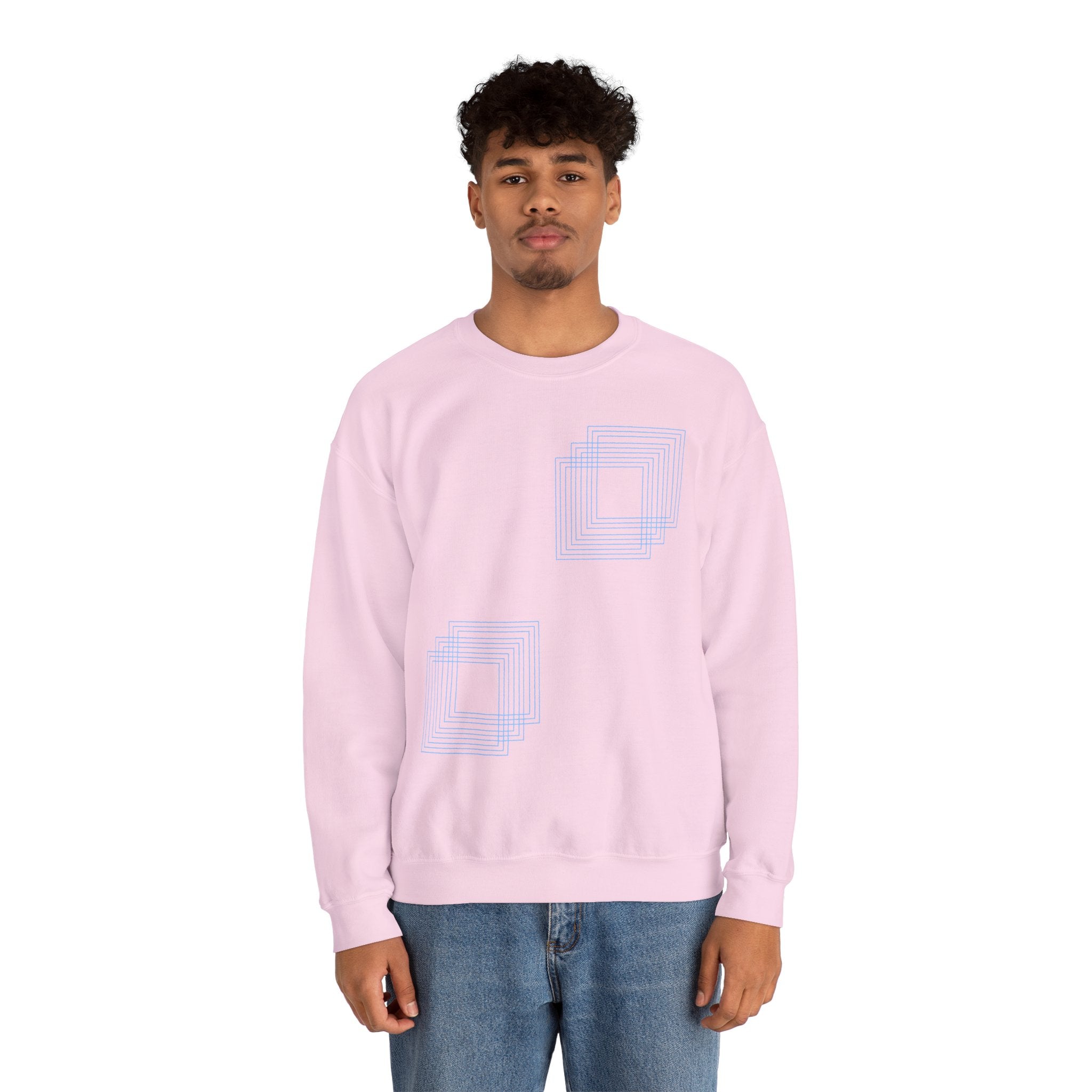 Light pink cotton sweatshirt with blue geometric square design, modeled, Comfy Elegance