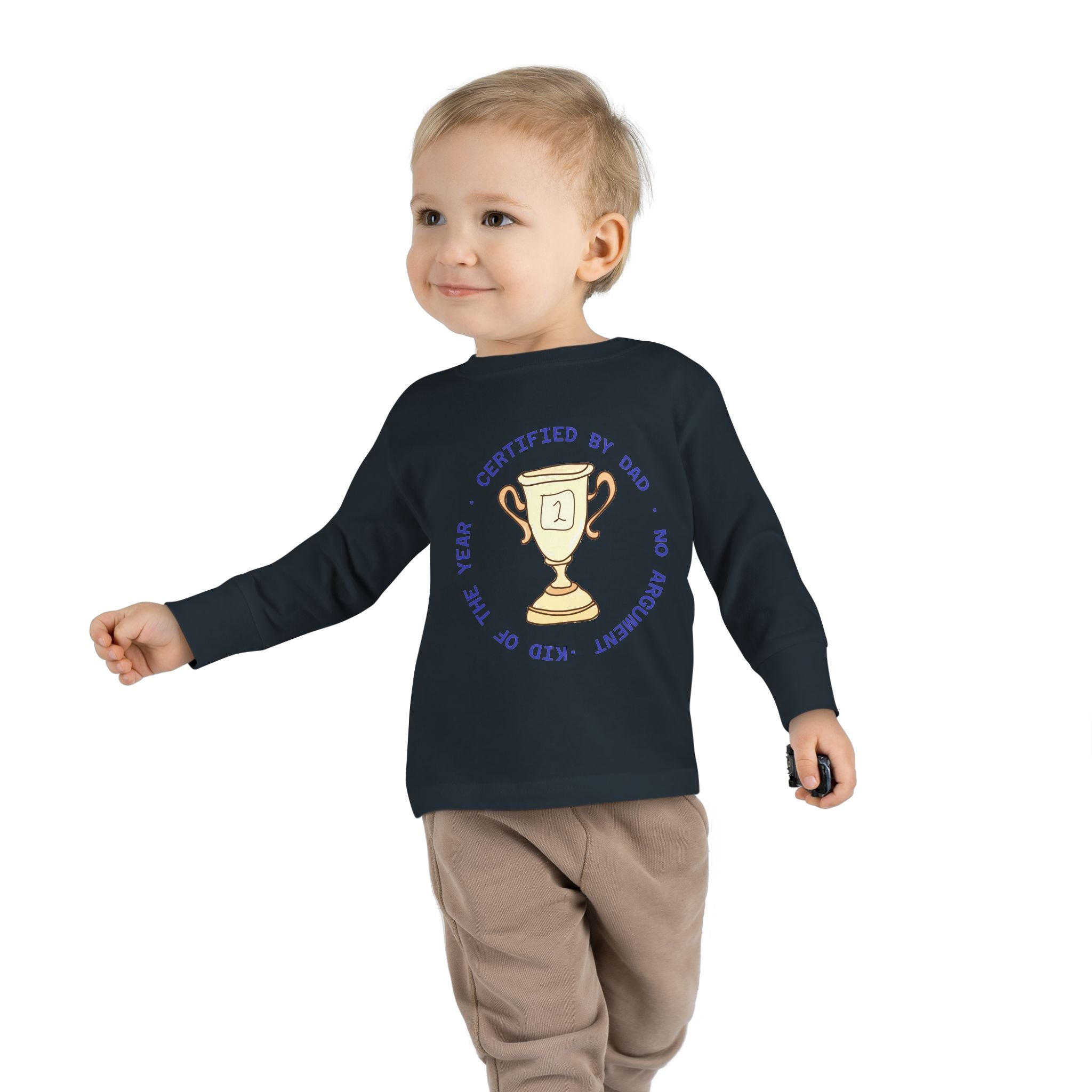 Toddler wearing a black long-sleeve cotton shirt with trophy graphic and playful text, Comfy Elegance