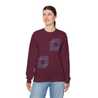 Woman wearing a burgundy cotton sweatshirt with geometric blue square design, Comfy Elegance